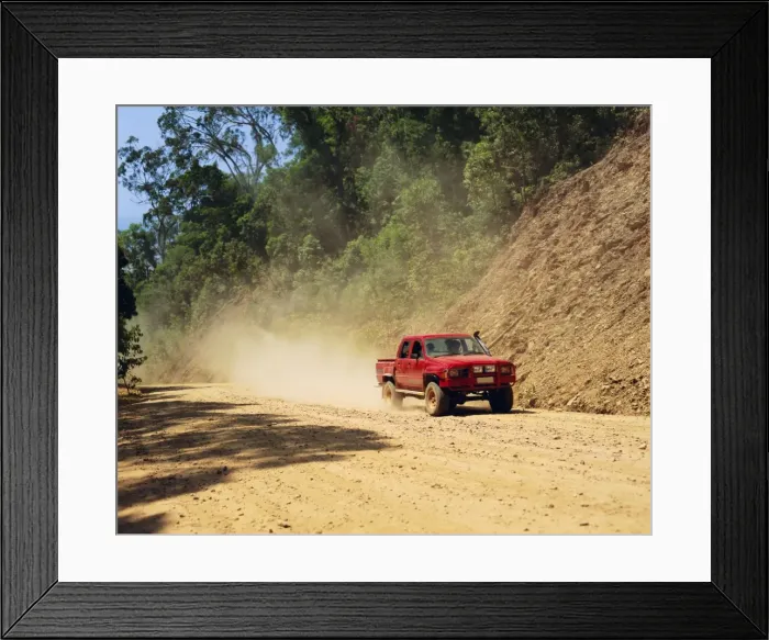 Framed Print : A red 4x4 pick-up on the dusty Bloomfield Track, Cape Tribulation National Park Framed Print : A red 4x4 pick-up on the dusty Bloomfield Track, Cape Tribulation National Park