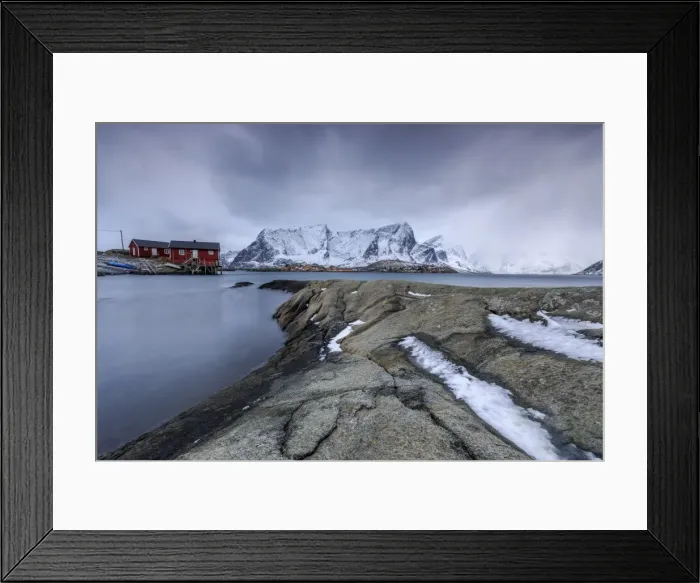 Framed Print : Typical landscape of Hamnoy with red houses of fishermen and the snowy mountains Framed Print : Typical landscape of Hamnoy with red houses of fishermen and the snowy mountains