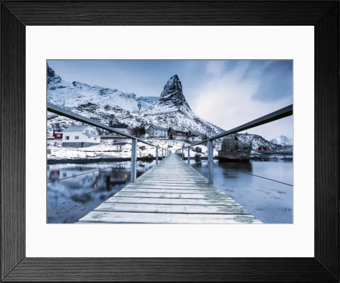 Framed Print : A bridge over the cold sea connects a typical fishing village. Reine, Lofoten Islands Framed Print : A bridge over the cold sea connects a typical fishing village. Reine, Lofoten Islands