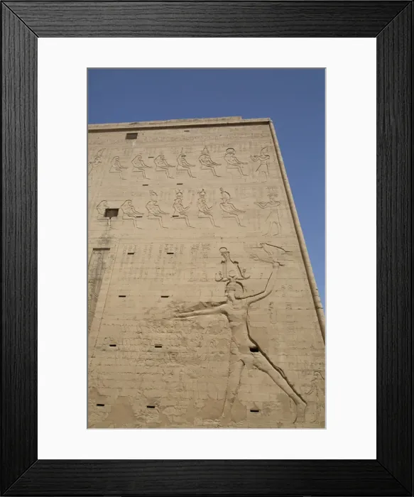 Framed Print : Relief depicting the Pharaoh slaying enemies, Pylon, Temple of Horus, Edfu, Egypt Framed Print : Relief depicting the Pharaoh slaying enemies, Pylon, Temple of Horus, Edfu, Egypt