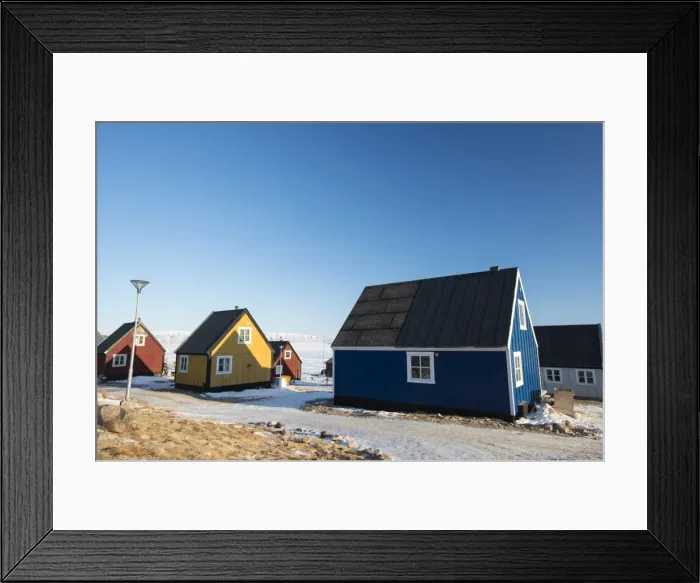 Framed Print : Colourful wooden houses in the village of Qaanaaq, one of the most northerly human Framed Print : Colourful wooden houses in the village of Qaanaaq, one of the most northerly human
