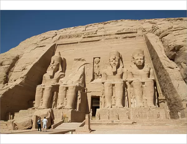 Tourists enjoying the site, Colossi of Ramses II, Sun Temple, Abu Simbel, UNESCO