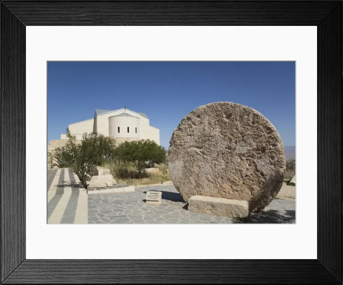 Framed Print : Abu Badd, a rolling stone used to fortify a door, Moses Memorial Church in the background Framed Print : Abu Badd, a rolling stone used to fortify a door, Moses Memorial Church in the background
