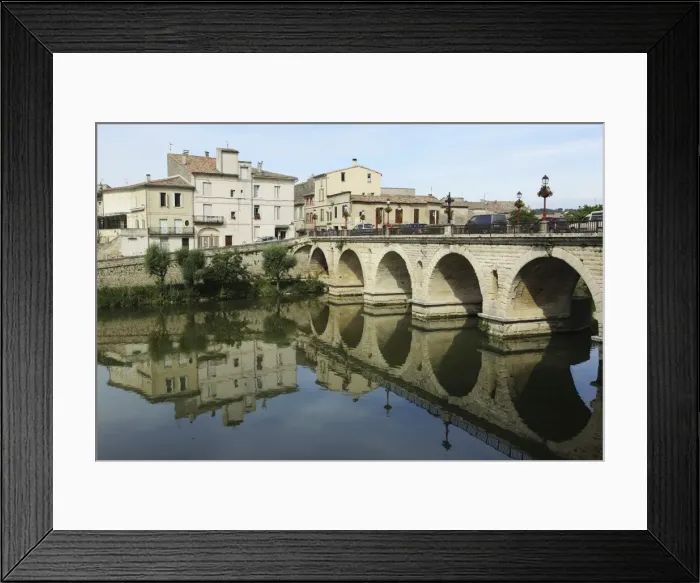 Framed Print : A Roman Bridge, built in the reign of the Emperor Tiberius, spans the River Vidourle at Sommieres Framed Print : A Roman Bridge, built in the reign of the Emperor Tiberius, spans the River Vidourle at Sommieres
