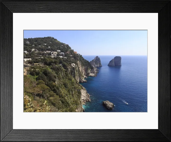 Framed Print : View to limestone pinnacles of Faraglioni rocks from Giardini di Augusto, with spring flowers Framed Print : View to limestone pinnacles of Faraglioni rocks from Giardini di Augusto, with spring flowers