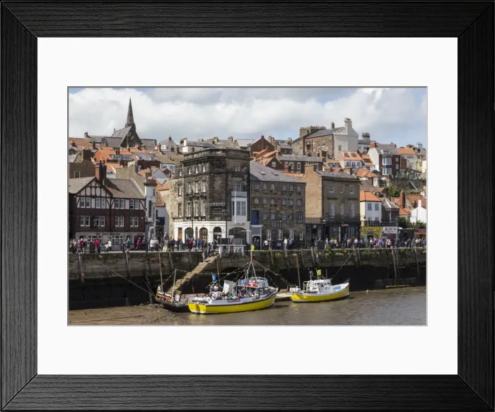 Framed Print : Boats moored on the West Side of the River Esk, with many passers-by on Pier Road Framed Print : Boats moored on the West Side of the River Esk, with many passers-by on Pier Road