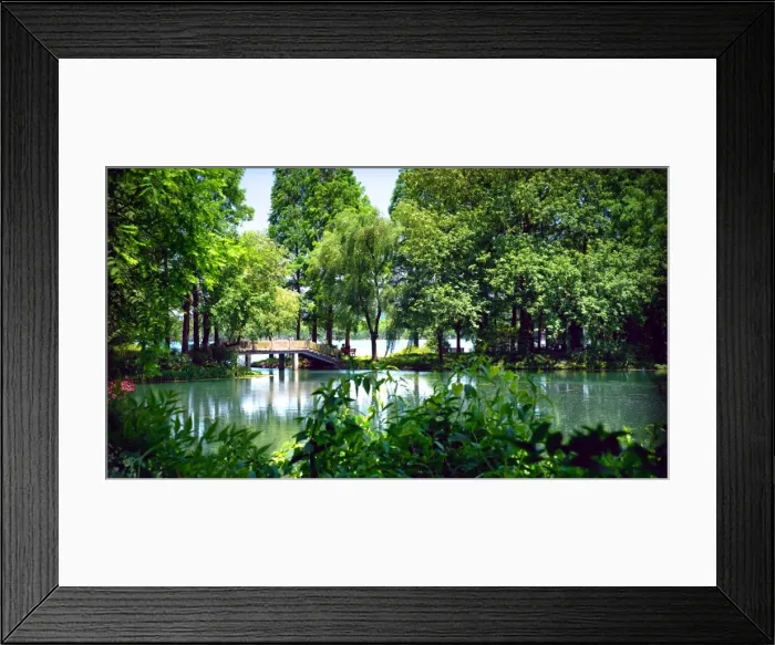 Framed Print : Secluded stone bridge surrounded by lush landscape at West Lake, Hangzhou, Zhejiang