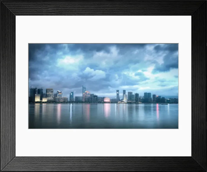 Framed Print : Blue hour shot of Jianggang district lights slowly coming to life under a dramatic sky Framed Print : Blue hour shot of Jianggang district lights slowly coming to life under a dramatic sky