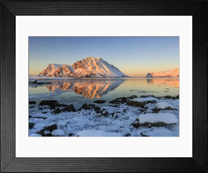 Framed Print : View of the mountains of Gymsoya (Gimsoya) from Smorten reflected in the clear partially frozen sea Framed Print : View of the mountains of Gymsoya (Gimsoya) from Smorten reflected in the clear partially frozen sea