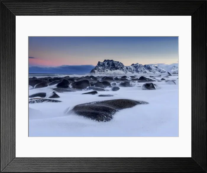 Framed Print : The cold wind that blows constantly shapes the snow on the rocks around Uttakleiv at dawn Framed Print : The cold wind that blows constantly shapes the snow on the rocks around Uttakleiv at dawn