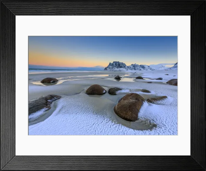 Framed Print : Dawn illuminates the rocks shaped by wind surrounded by fresh snow, Uttakleiv, Lofoten Islands Framed Print : Dawn illuminates the rocks shaped by wind surrounded by fresh snow, Uttakleiv, Lofoten Islands