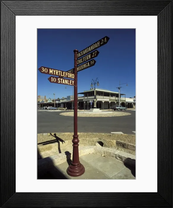 Framed Print : Direction signs at corner of Ford and Albert Streets, Beechworth, Victoria Framed Print : Direction signs at corner of Ford and Albert Streets, Beechworth, Victoria