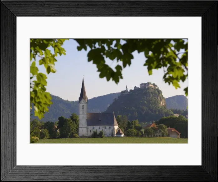 Framed Print : Schloss Hochosterwitz with village church, Carinthia, Austria Framed Print : Schloss Hochosterwitz with village church, Carinthia, Austria