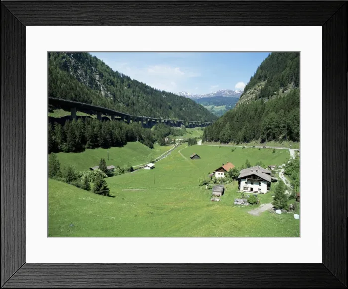 Framed Print : Descending the Brenner Pass in May, down towards Innsbruck, with autobahn on left Framed Print : Descending the Brenner Pass in May, down towards Innsbruck, with autobahn on left