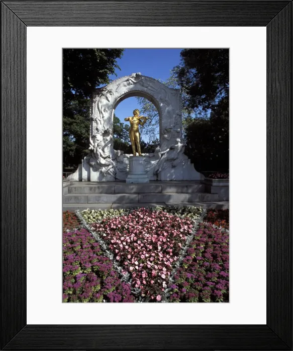 Framed Print : Statue of the composer Johann Strauss on the Strauss Memorial, and flowerbed in Johann Strauss State Park (Stadtpark), Vienna Framed Print : Statue of the composer Johann Strauss on the Strauss Memorial, and flowerbed in Johann Strauss State Park (Stadtpark), Vienna