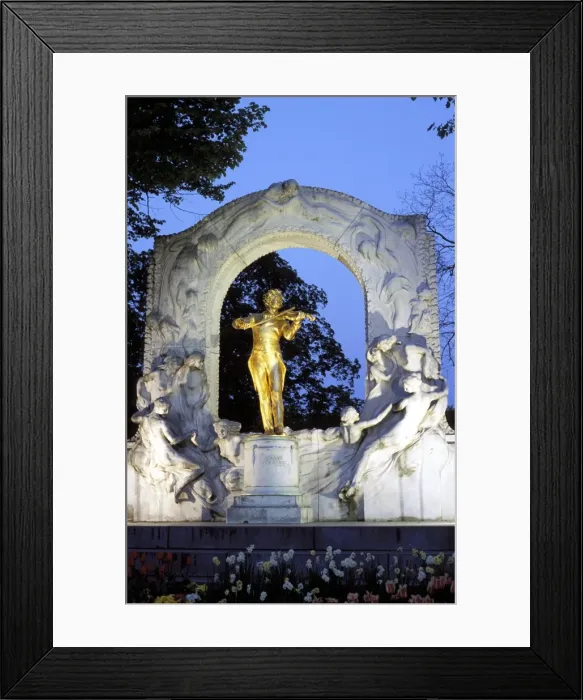 Framed Print : Statue of the composer Johann Strauss on the Strauss memorial at twilight Framed Print : Statue of the composer Johann Strauss on the Strauss memorial at twilight