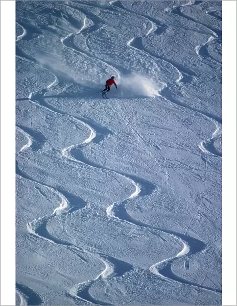 Skiers in powder snow