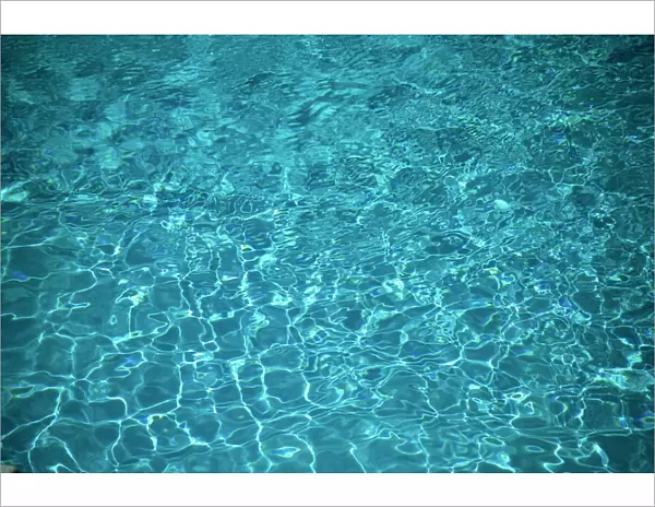 Water glistening in a swimming pool