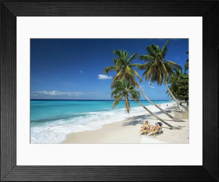 Framed Print : Sunbathers on Worthing Beach, on the south coast, Christ Church, Barbados Framed Print : Sunbathers on Worthing Beach, on the south coast, Christ Church, Barbados