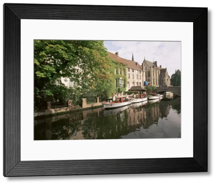 Framed Print : View along River Dijver towards Bridge of St. John of Nepomucenus, Bruges (Brugge) Framed Print : View along River Dijver towards Bridge of St. John of Nepomucenus, Bruges (Brugge)