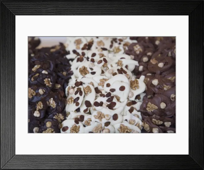 Framed Print : Chocolate covered in nuts and raisins in shop, Bruges, Belgium, Europe Framed Print : Chocolate covered in nuts and raisins in shop, Bruges, Belgium, Europe