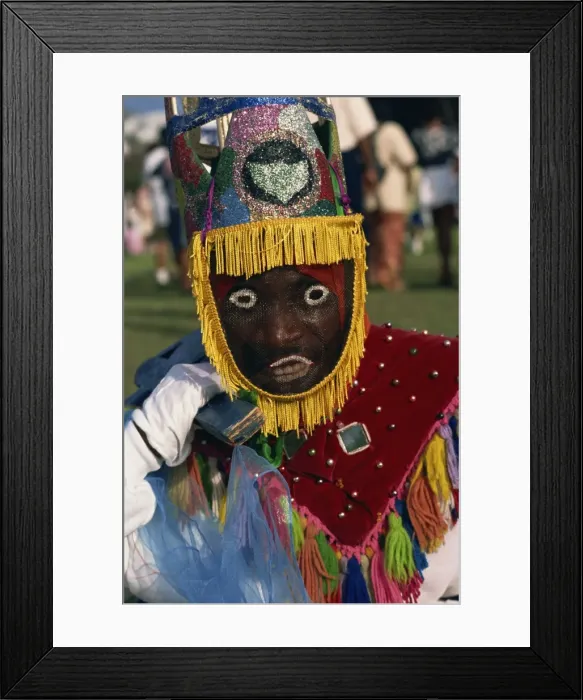 Framed Print : Head and shoulders portrait of a person wearing mask headdress and brightly coloured costume Framed Print : Head and shoulders portrait of a person wearing mask headdress and brightly coloured costume