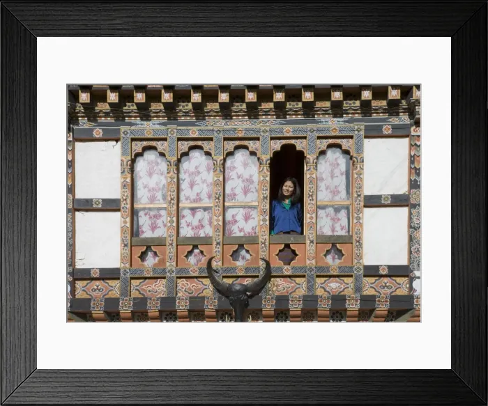 Framed Print : Bhutanese woman at window of typical Bhutanese house, Jankar, Bumthang Valley Framed Print : Bhutanese woman at window of typical Bhutanese house, Jankar, Bumthang Valley