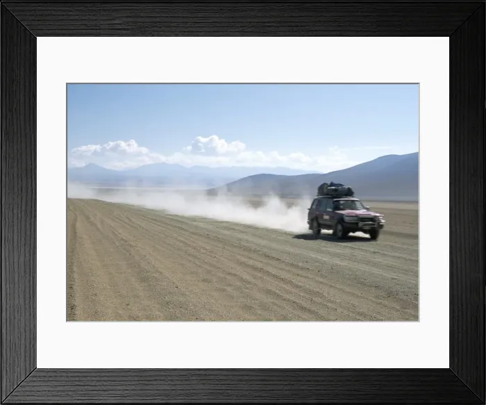 Framed Print : Land cruiser on altiplano track with tourists going to Laguna Colorado Framed Print : Land cruiser on altiplano track with tourists going to Laguna Colorado