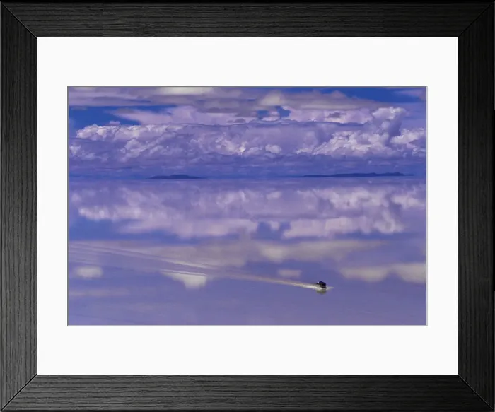 Framed Print : Bus driving through the ethereal landscape of the Salar de Uyuni, Salar de Uyuni salt lake Framed Print : Bus driving through the ethereal landscape of the Salar de Uyuni, Salar de Uyuni salt lake