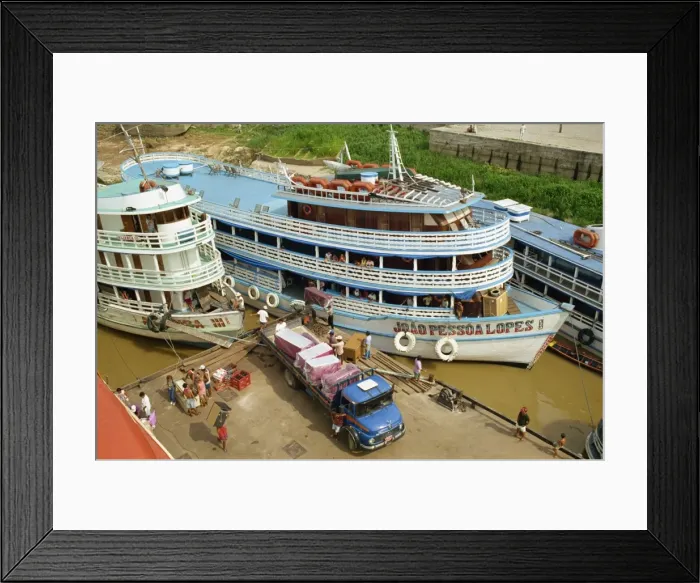 Framed Print : River boats on the quayside being unloaded at Parintins in the Amazon area of Brazil Framed Print : River boats on the quayside being unloaded at Parintins in the Amazon area of Brazil