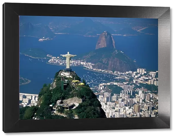 Aerial view of city with the Cristo Redentor (Christ the Redeemer) statue in foreground