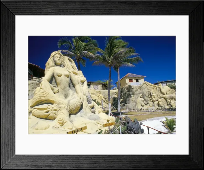 Framed Print : Giant sand sculpture of a mermaid and bungalows on the Ceara coastline Framed Print : Giant sand sculpture of a mermaid and bungalows on the Ceara coastline