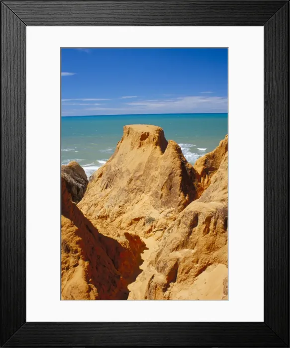 Framed Print : Red rock formations of Morro Branco on the Ceara coastline, near Canoa Quedrada