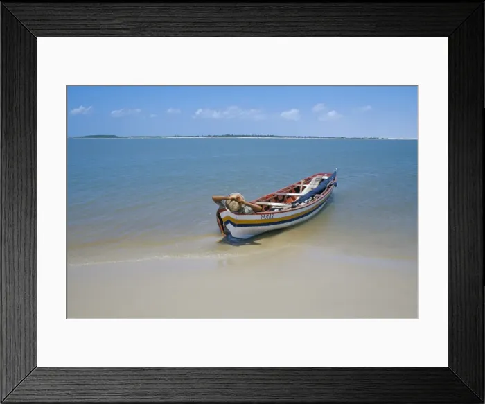 Framed Print : Fisherman resting on his boat, Parque Nacional dos Lencois Maranhenses Framed Print : Fisherman resting on his boat, Parque Nacional dos Lencois Maranhenses