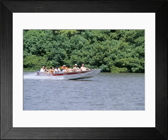 Framed Print : Tourists in speed boat riding on Rio Preguica, Parque Nacional dos Lencois Maranhenses Framed Print : Tourists in speed boat riding on Rio Preguica, Parque Nacional dos Lencois Maranhenses