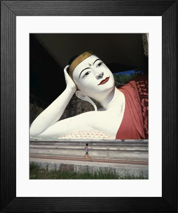Framed Print : Young boy running in front of reclining Shwe Tha Lyaung Buddha, Mergui (Myeik) Framed Print : Young boy running in front of reclining Shwe Tha Lyaung Buddha, Mergui (Myeik)