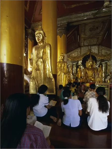 Worshippers in the pavilion where hti was placed, Shwedagon Paya (Shwe Dagon Pagoda)