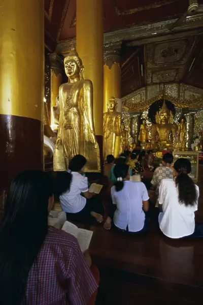 Worshippers in the pavilion where hti was placed, Shwedagon Paya (Shwe Dagon Pagoda)