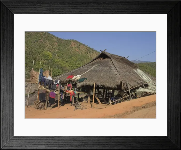 Framed Print : Thatched house with clothes drying, Ann Village, Kengtung (Kyaing Tong) Framed Print : Thatched house with clothes drying, Ann Village, Kengtung (Kyaing Tong)