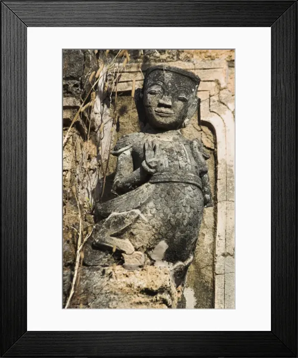 Framed Print : Figure carved in stucco decorates one of the ancient stupas, Kakku Buddhist Ruins