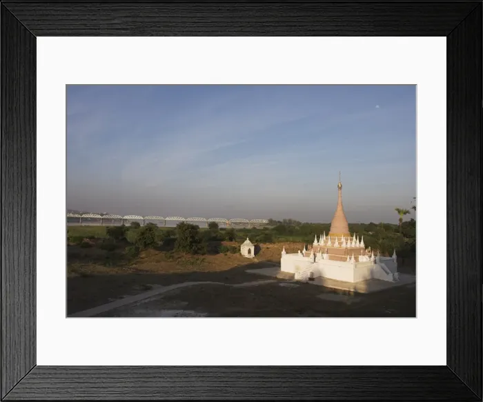 Framed Print : Pagoda at Maha Aungmye Bonzan monastery with the Ava bridge over the Ayeyarwaddy River beyond Framed Print : Pagoda at Maha Aungmye Bonzan monastery with the Ava bridge over the Ayeyarwaddy River beyond