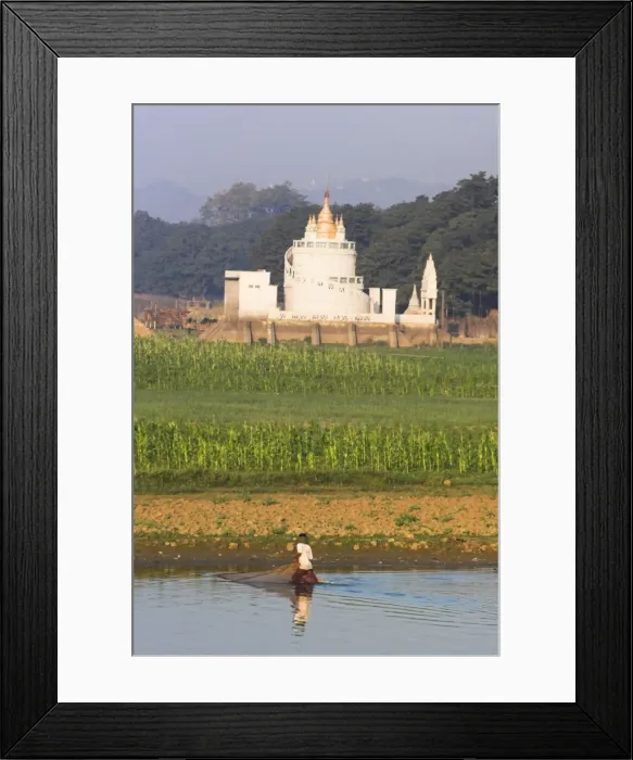 Framed Print : Man fishing on Taugthaman Lake near Spiral temple and U Beins Bridge Framed Print : Man fishing on Taugthaman Lake near Spiral temple and U Beins Bridge