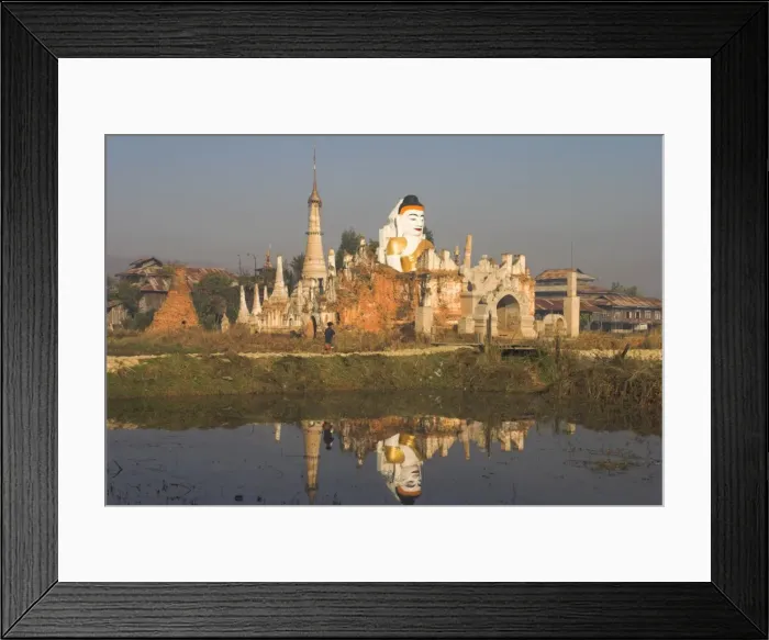 Framed Print : Women walking past huge sitting Buddha said to be 700 years old, at Kyaukh-pyugyi Paya Framed Print : Women walking past huge sitting Buddha said to be 700 years old, at Kyaukh-pyugyi Paya