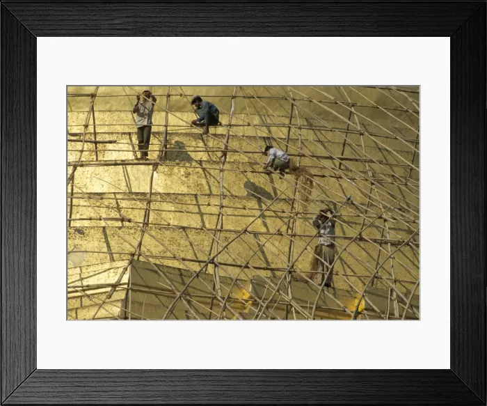 Framed Print : Workers on bamboo scaffolding applying fresh gold leaf to the Shwedagon Pagoda Framed Print : Workers on bamboo scaffolding applying fresh gold leaf to the Shwedagon Pagoda