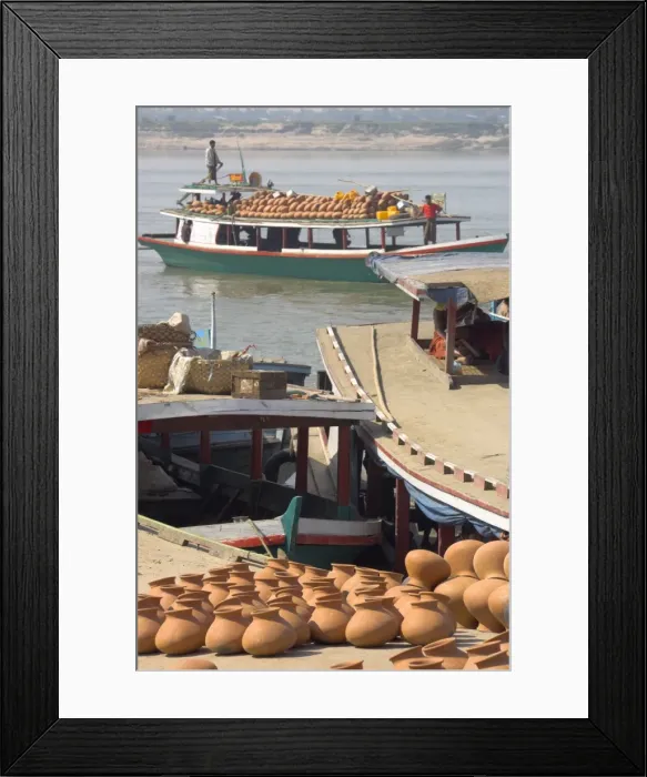 Framed Print : Wooden boats transporting pottery on the Ayeryarwady (Irrawaddy) River Framed Print : Wooden boats transporting pottery on the Ayeryarwady (Irrawaddy) River