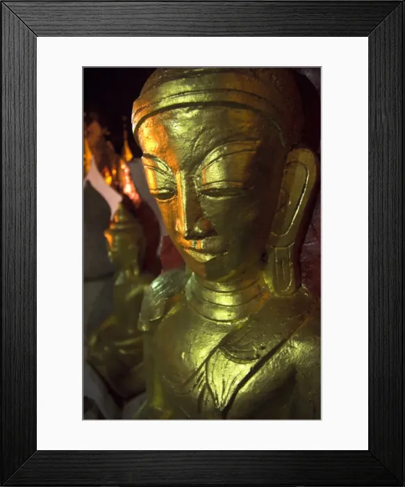 Framed Print : Close up of a large golden Buddha in artificial light, Pindaya Natural Cave Museum Framed Print : Close up of a large golden Buddha in artificial light, Pindaya Natural Cave Museum