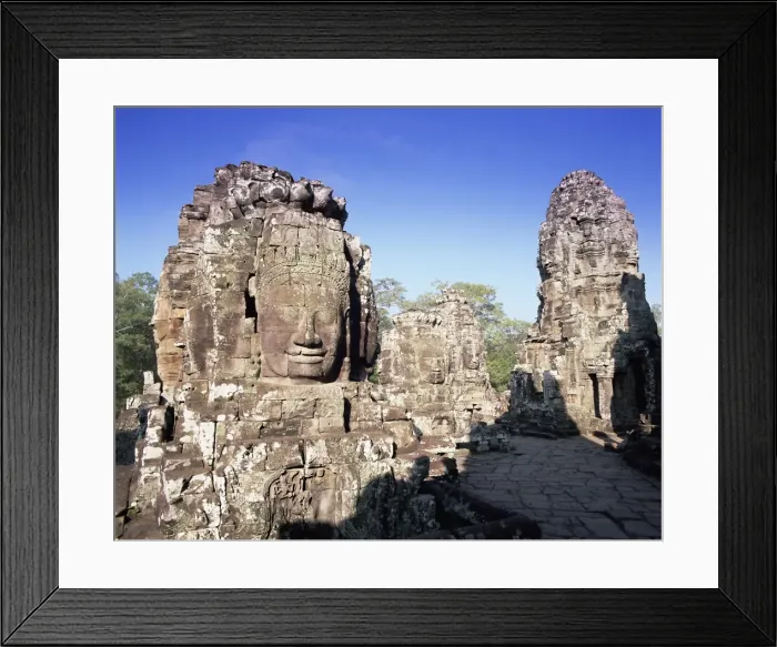 Framed Print : The Bayon and stone faces of Lokesvara, temples of Angkor, UNESCO World Heritage Site Framed Print : The Bayon and stone faces of Lokesvara, temples of Angkor, UNESCO World Heritage Site