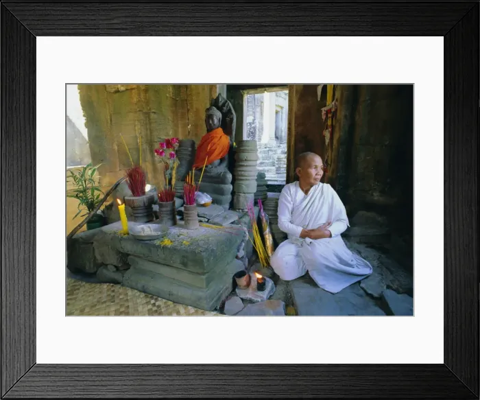 Framed Print : Buddhist nun meditating in the Bayon Temple, at Angkor, Siem Reap, Cambodia Framed Print : Buddhist nun meditating in the Bayon Temple, at Angkor, Siem Reap, Cambodia