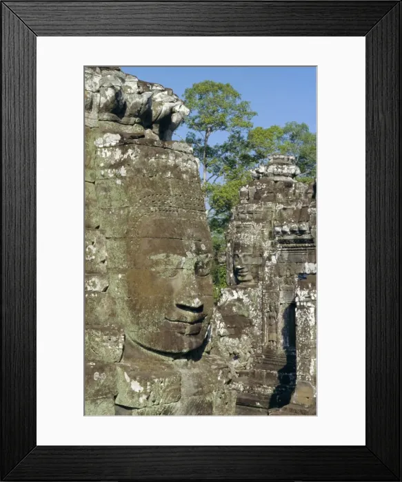 Framed Print : Myriad stone heads typifying Cambodia in the Bayon Temple, Angkor, Siem Reap, Cambodia Framed Print : Myriad stone heads typifying Cambodia in the Bayon Temple, Angkor, Siem Reap, Cambodia