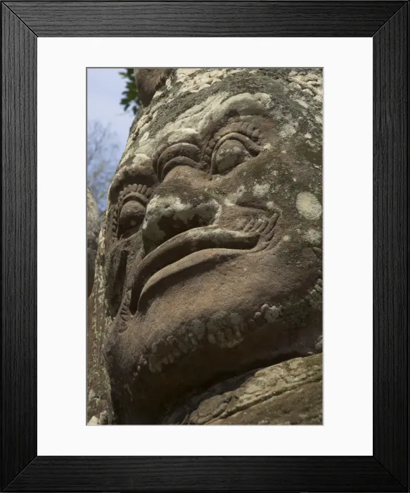 Framed Print : Stone statuary of human face, Ta Prohm temple, Angkor, UNESCO World Heritage Site Framed Print : Stone statuary of human face, Ta Prohm temple, Angkor, UNESCO World Heritage Site